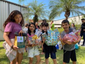 sonhos-e-sorrisos-unem-colaboradores-do-grupo-jorge-zanatta-e-criancas-do-bairro-da-juventude-em-acao-de-natal